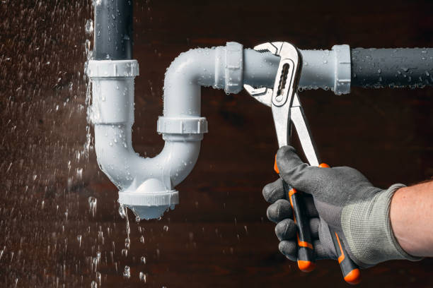 Professional Sewer Line Repair technician working in Woodburn, IN